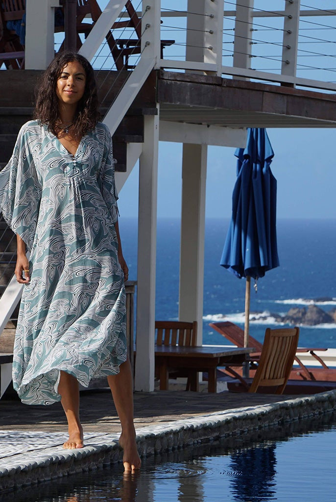 Wear loose on the beach in the heat of the day or gather at the back to transform into a beautiful maxi dress for instant evening elegance.