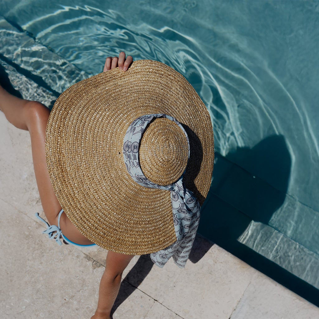 A versatile accessory, we love that scarves & bandanas can be worn in multiple ways as a hair accessory, tied around your neck or even worn as a top. Match yours to other outfits and add some sunglasses for a retro look.