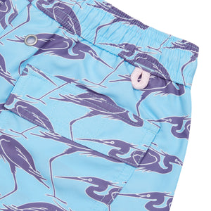 Pocket detail of sustainable Mens swim shorts in blue Egret bird print by Lotty B Mustique