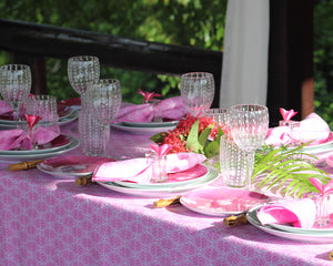 laid dinner table with pink theme