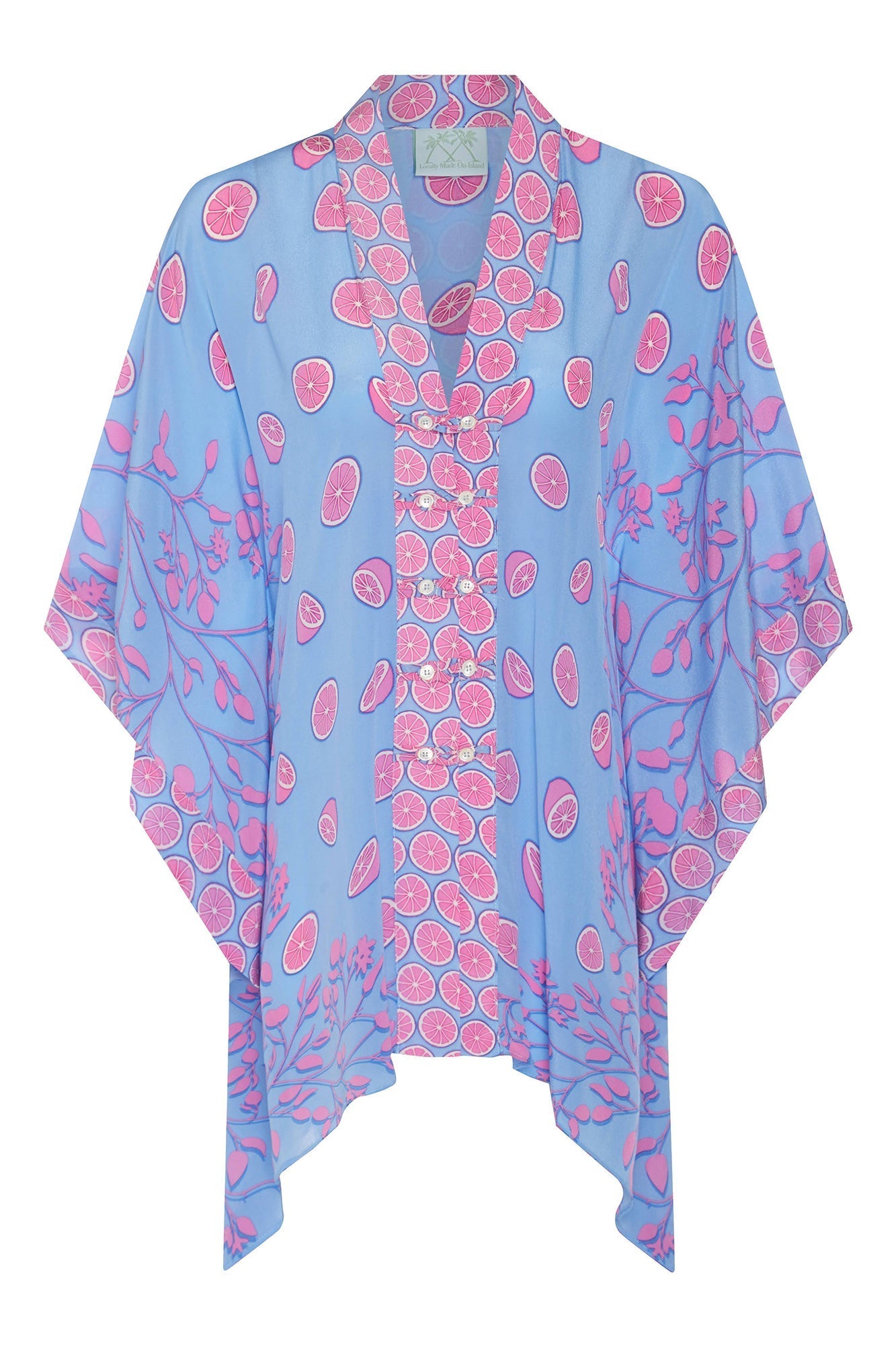 Front view of Lotty B Jade Poncho in Lime Tree Blue and Pink – lightweight silk crepe-de-Chine poncho with citrus slice print, buttoned front, and flowing botanical detailing, designed for refined resortwear.