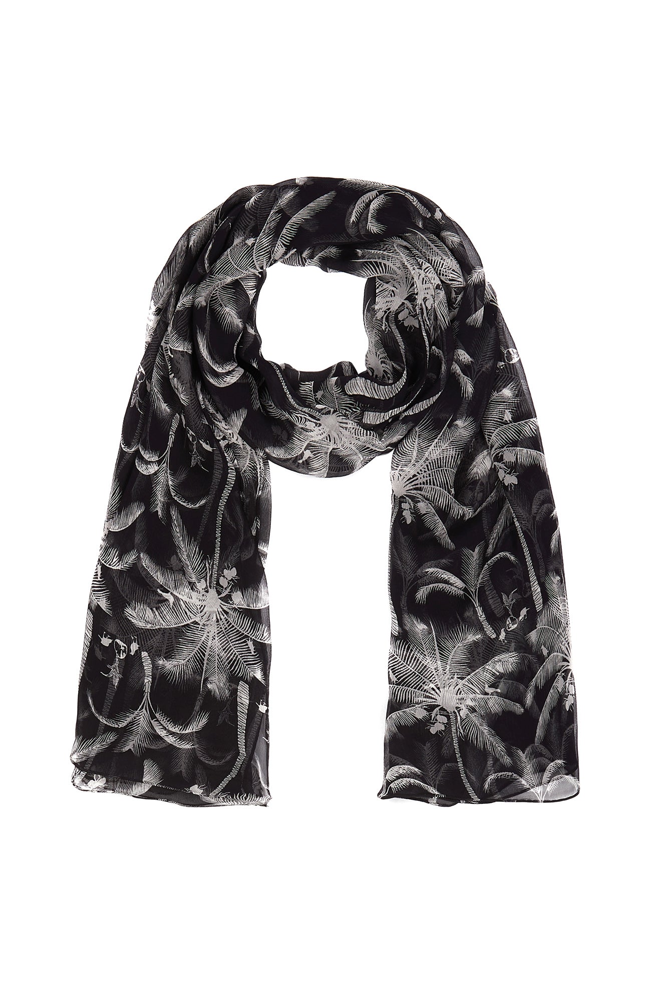 A versatile Lotty B chiffon silk sarong in black and white Plantation pattern can be styled as a scarf, hat band, bandeau top or skirt by designer Lotty B Mustique Island