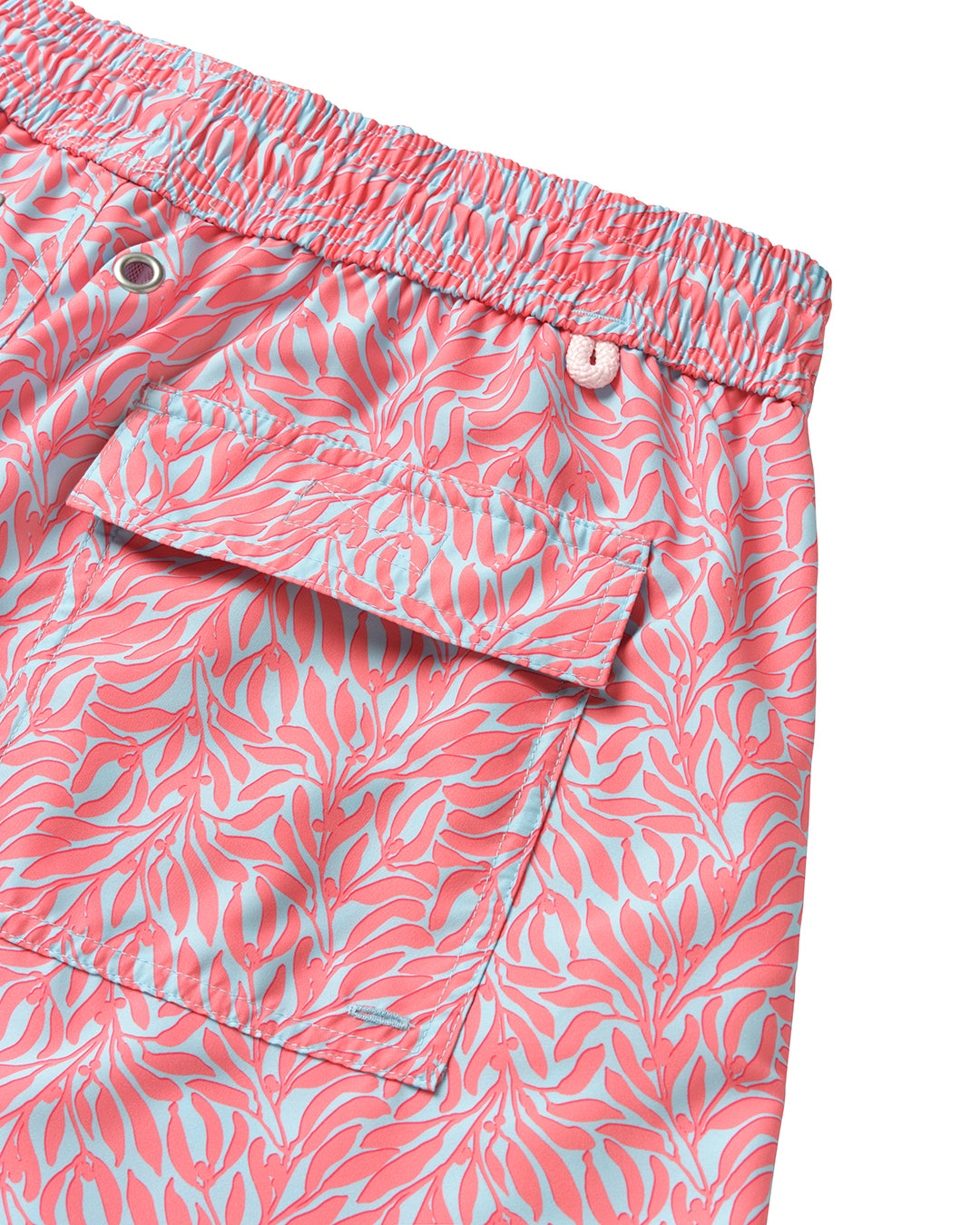 Men's eco swim shorts back pocket detail in coral red and blue Sealeaf print from Pink House