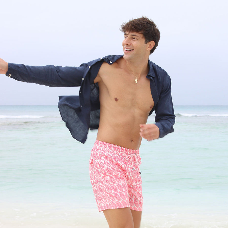 Men's swim shorts in coral pink Striped Shell print by designer Lotty B
