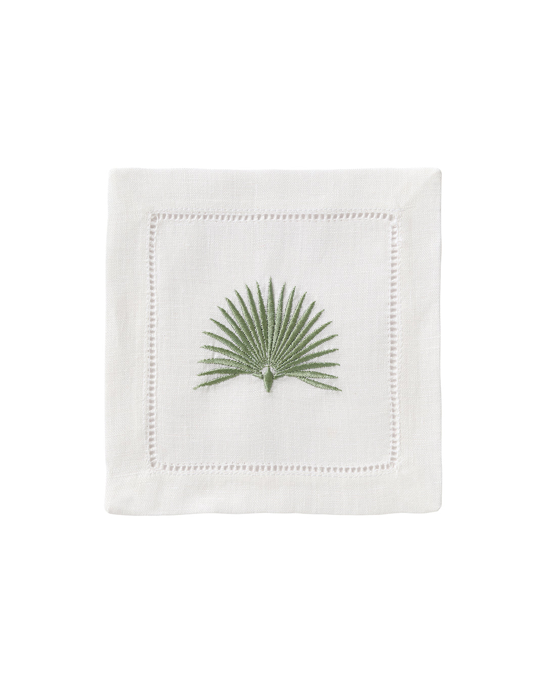 White linen cocktail napkin with sage green embroidered fan palm motif