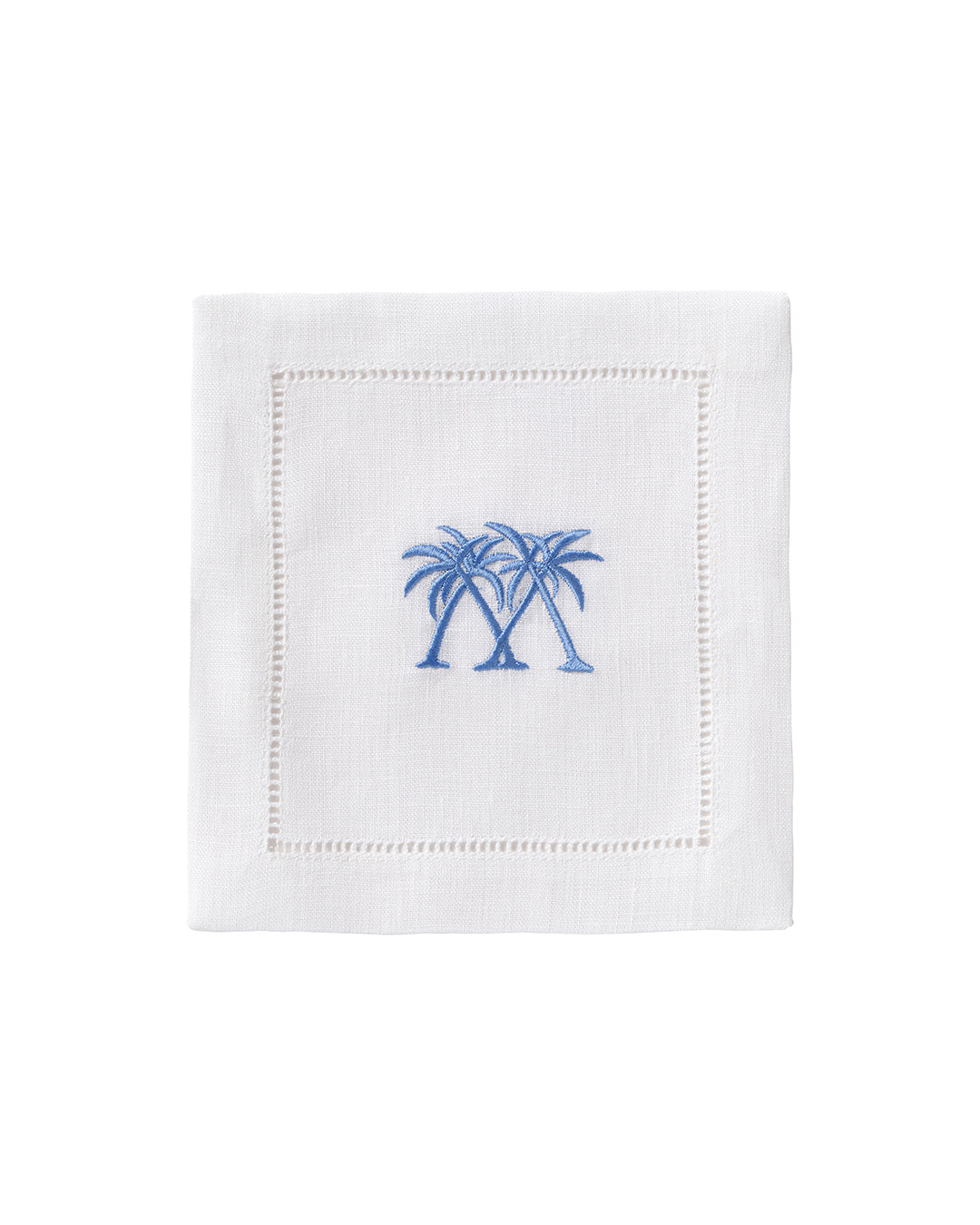 White linen cocktail napkin with blue embroidered crossed palms – elegant tropical napkin