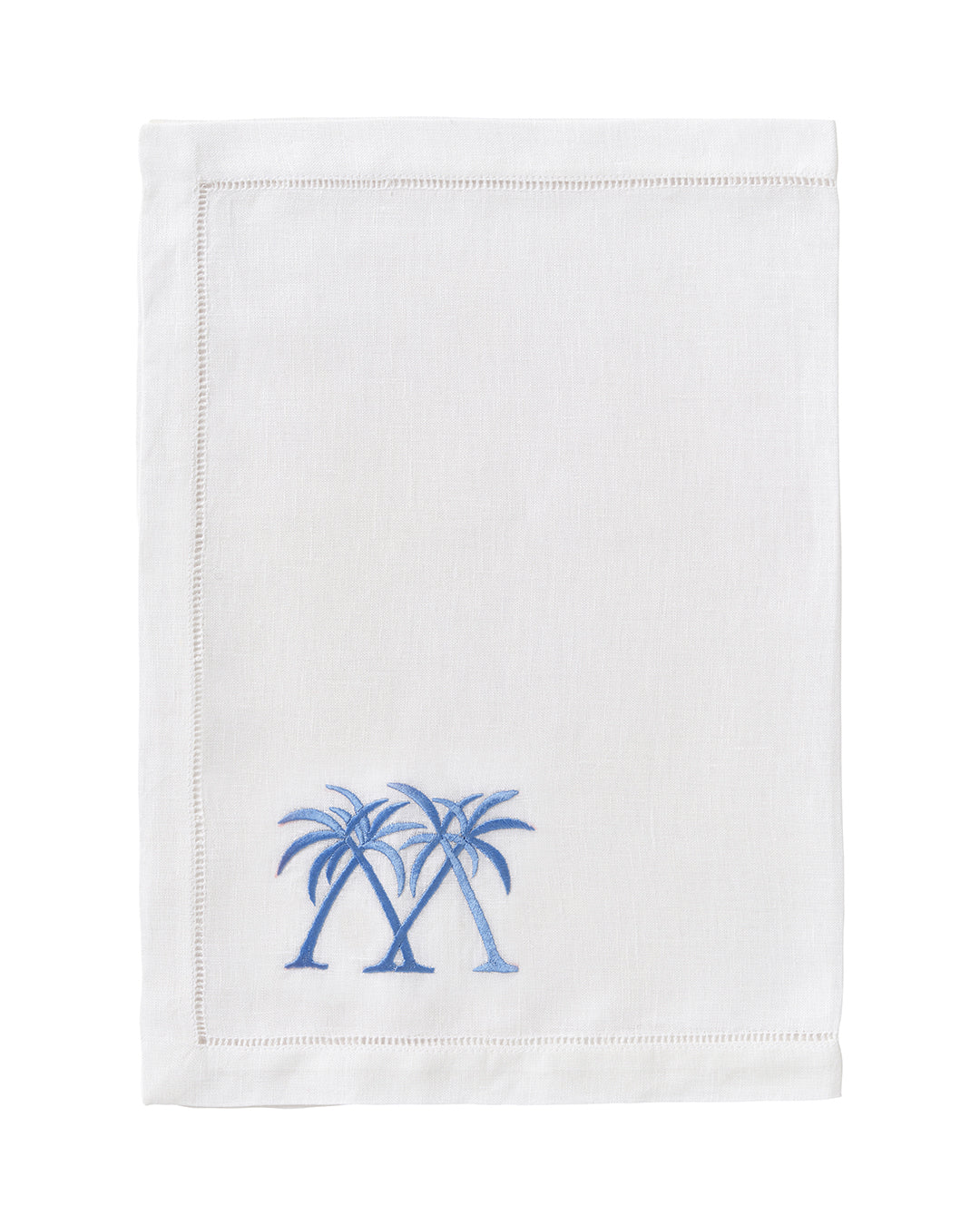 White pure linen placemat with azure blue palm embroidery – luxury tropical dining by Pink House Mustique
