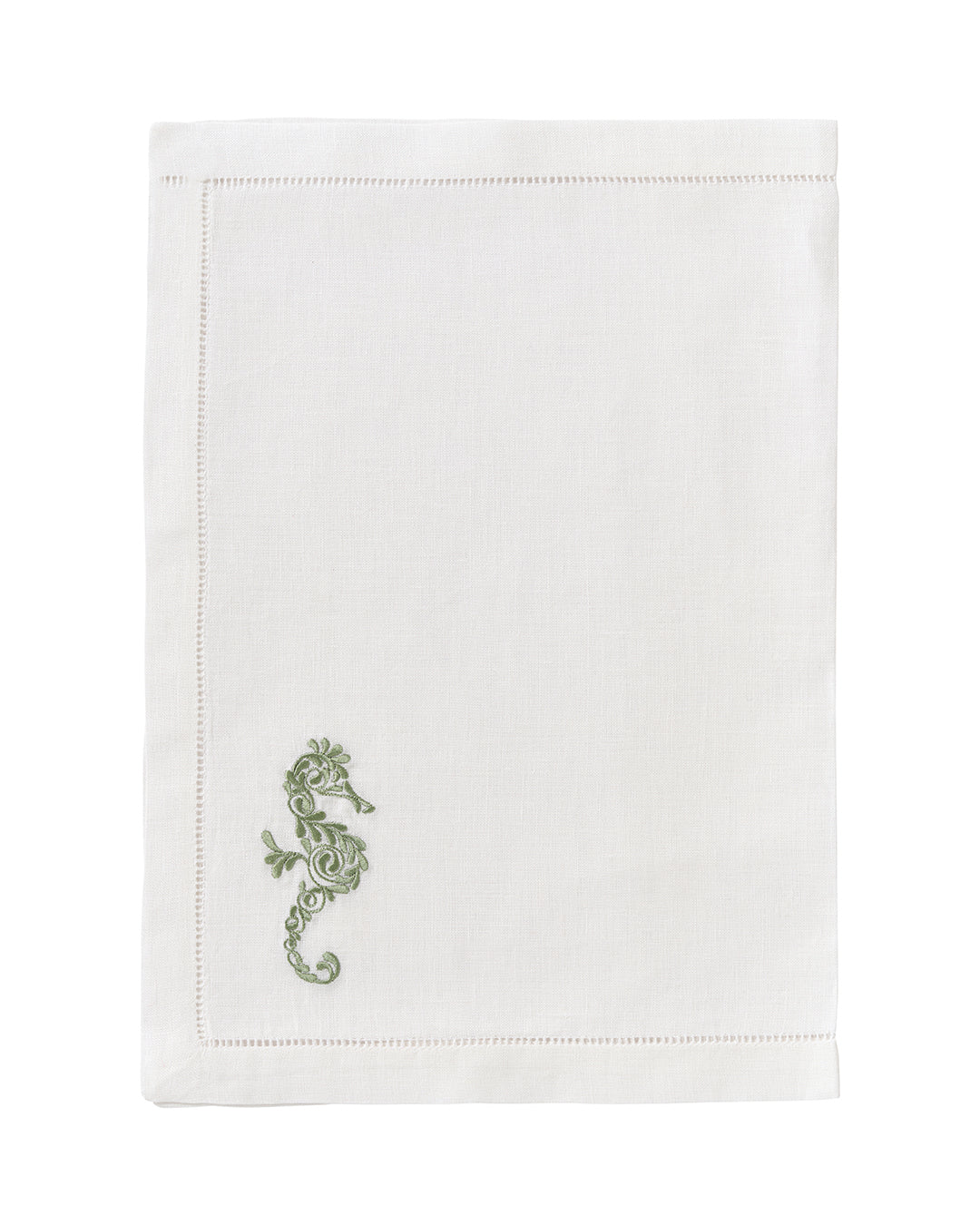 White linen placemat with sage green embroidered seahorse – luxury coastal embroidered table linen by Pink House Mustique