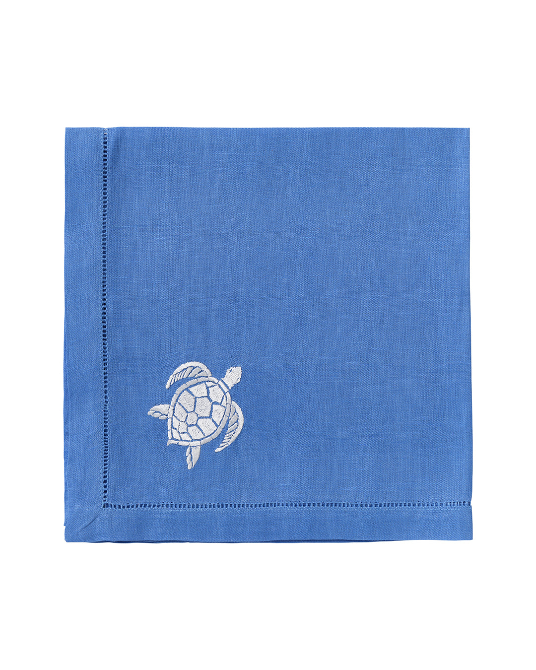 Pure linen napkin in azure blue with white turtle embroidery – marine-inspired luxury coastal table linen