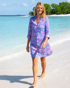 Women’s blue and pink Iguana linen Decima dress by Pink House Mustique, luxury beachwear style.