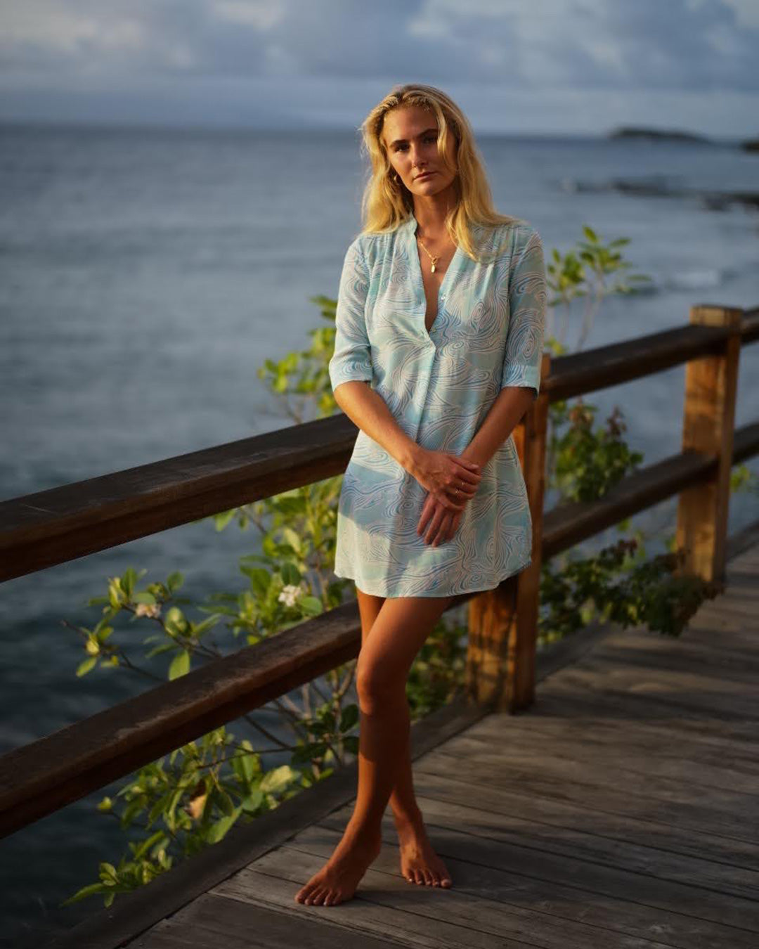 Turquoise Whale print Decima silk dress by Lotty B, photographed on Mustique