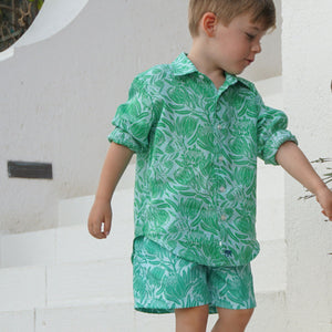 Designer childrens vacation outfit in green floral Protea print