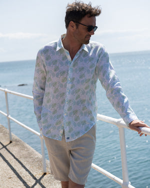 Holiday villa style mens linen shirt in Monkey & Palm pale blue & green print by designer Lotty B