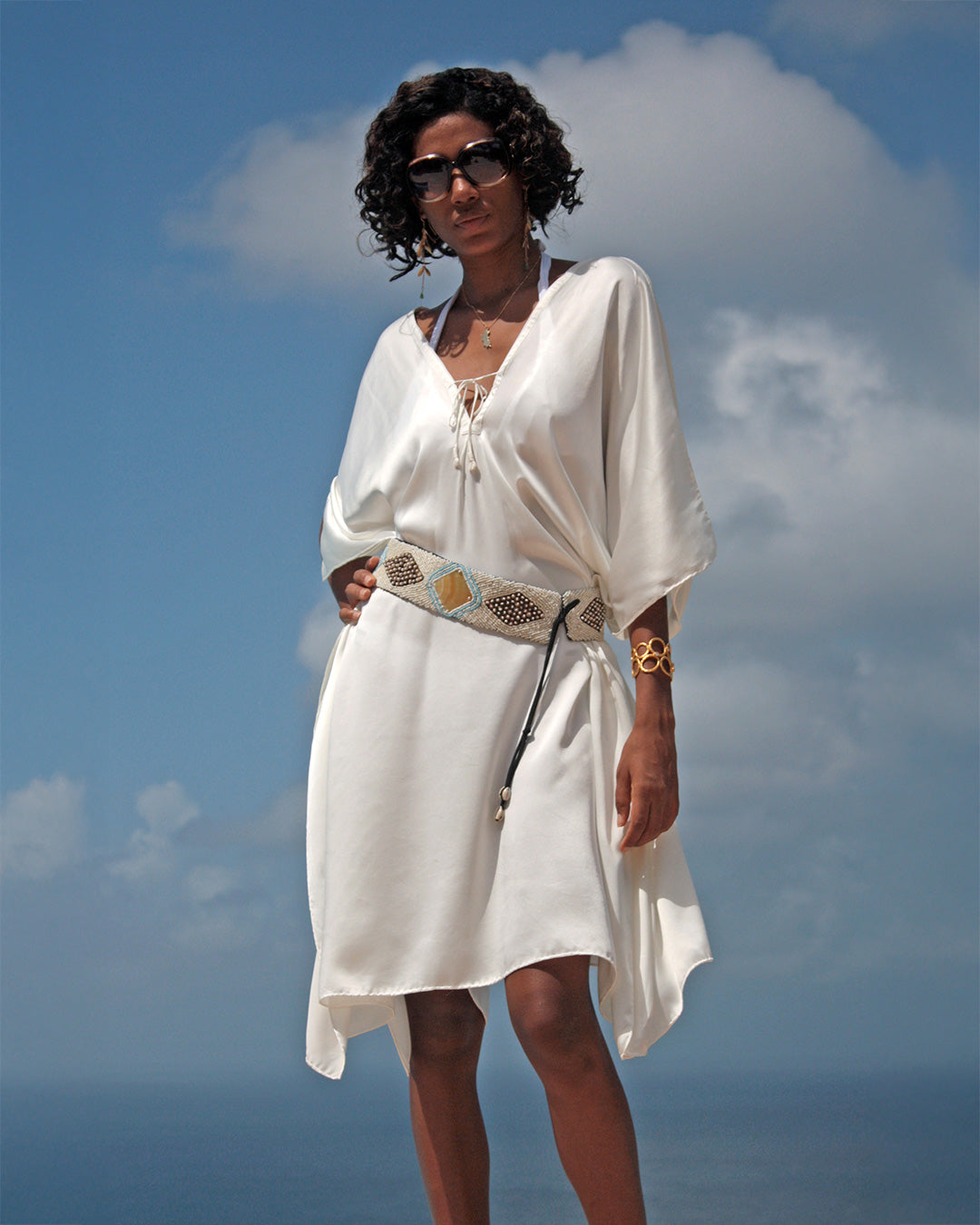 Front view of white silk charmeuse kaftan with beaded belt - lightweight silk dress, chic bohemian style, resort fashion