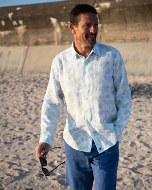 Beach style mens linen shirt in Monkey & Palm pale blue & green print by designer Lotty B