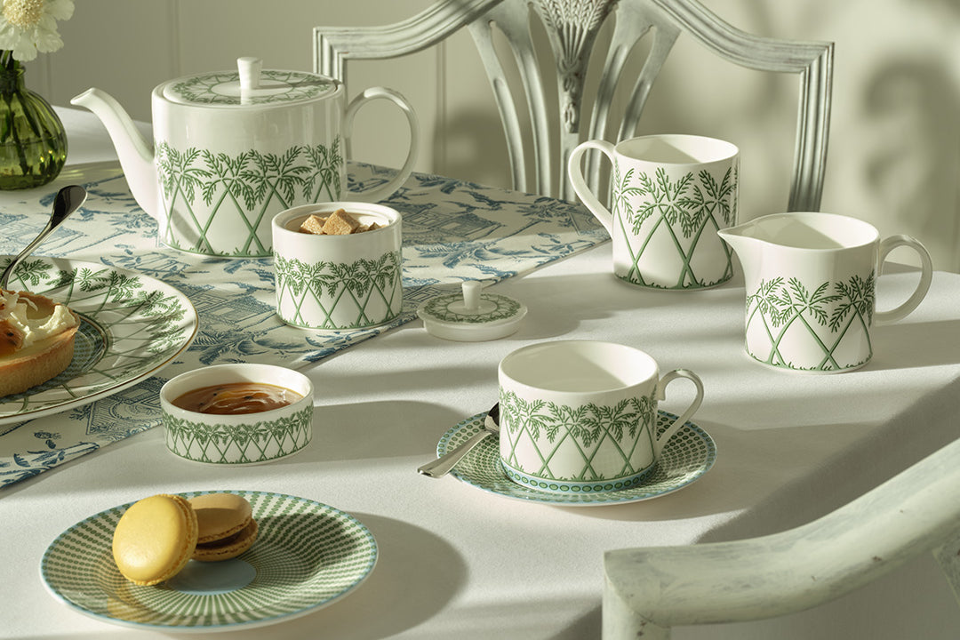 Elegant fine bone china tea service set including teapot, sugar bowl, and jug in Palms Sage Green by Lotty B Mustique, handcrafted in England.