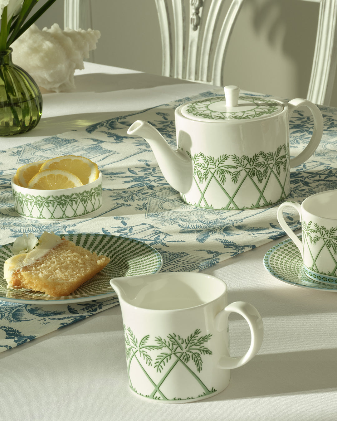 Fine bone china small teapot, milk jug and lemon dish in Palms Sage Green by Lotty B Mustique, elegant English tableware.