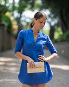 Close-up of Sax Blue linen Decima dress with V-neck and 3/4 sleeves – breathable summer dress or vacation tunic in pure linen