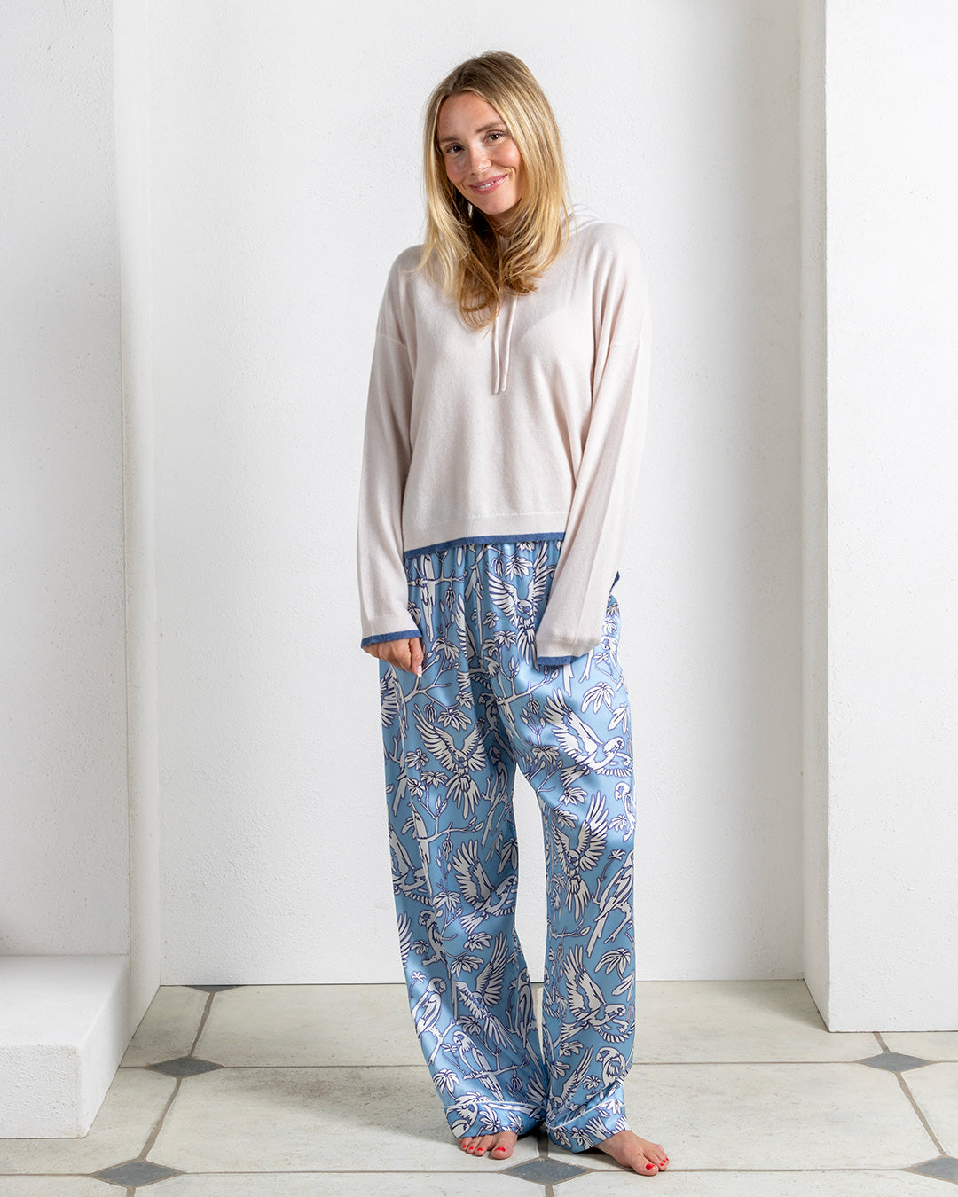 Luxury cashmere hoodie collab Darlin London x Pink House Mustique pale beige navy trim worn with silk Parrot pjs