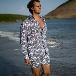 Mens vacation co-ords swim shorts in navy blue floral Protea print