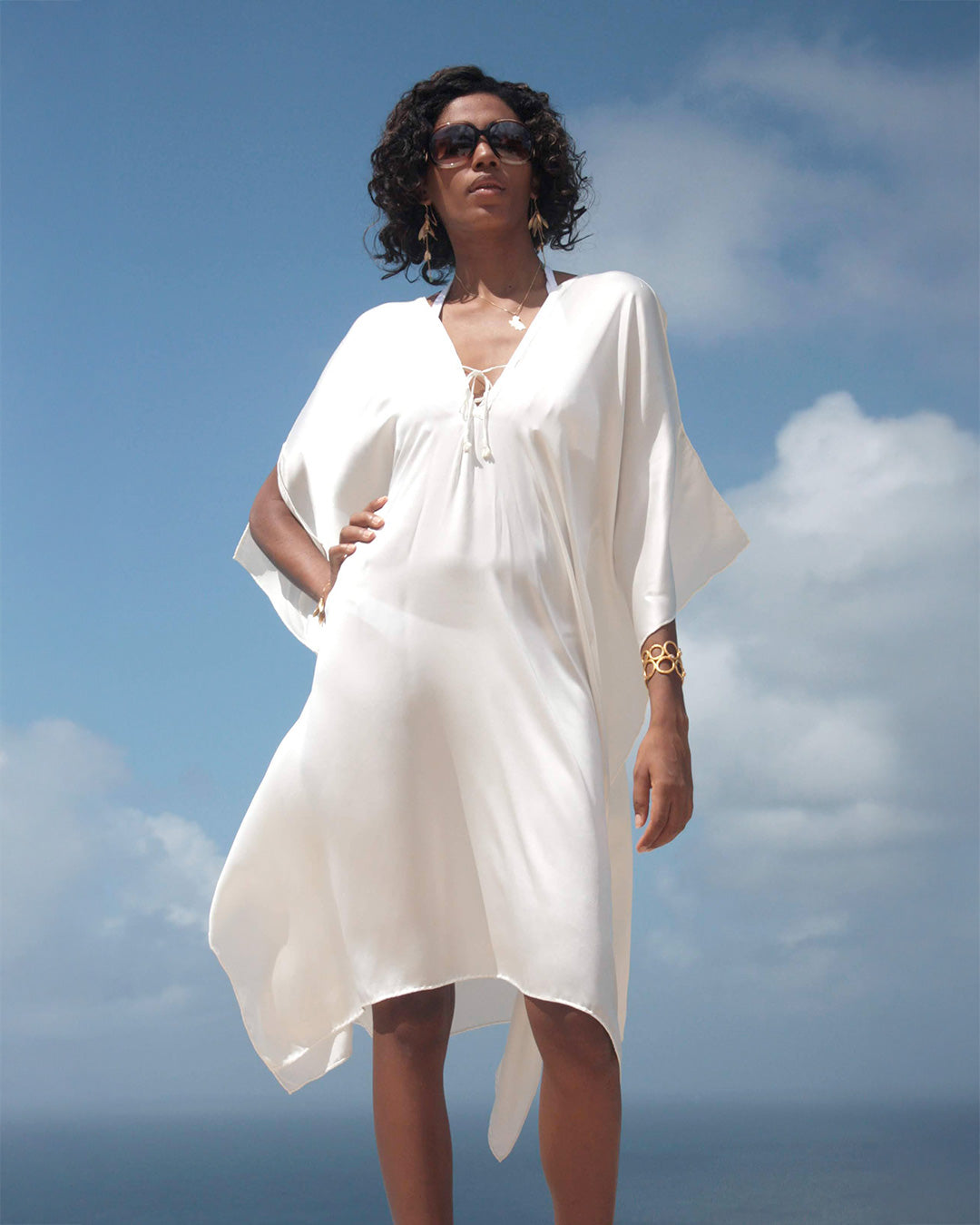 Full front view of white silk charmeuse kaftan with tassel ties - elegant beach dress, luxury vacation outfit, flowing silk kaftan.