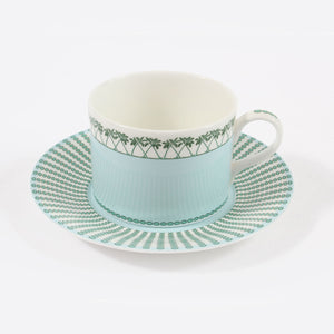 Fine bone china coffee cup and saucer in Mustique Island green design by Lotty B