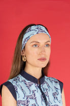 woman with silk bandana and matching waistcoat top