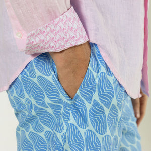 Men's quick dry swim trunks in blue Striped Shell print by designer Lotty B