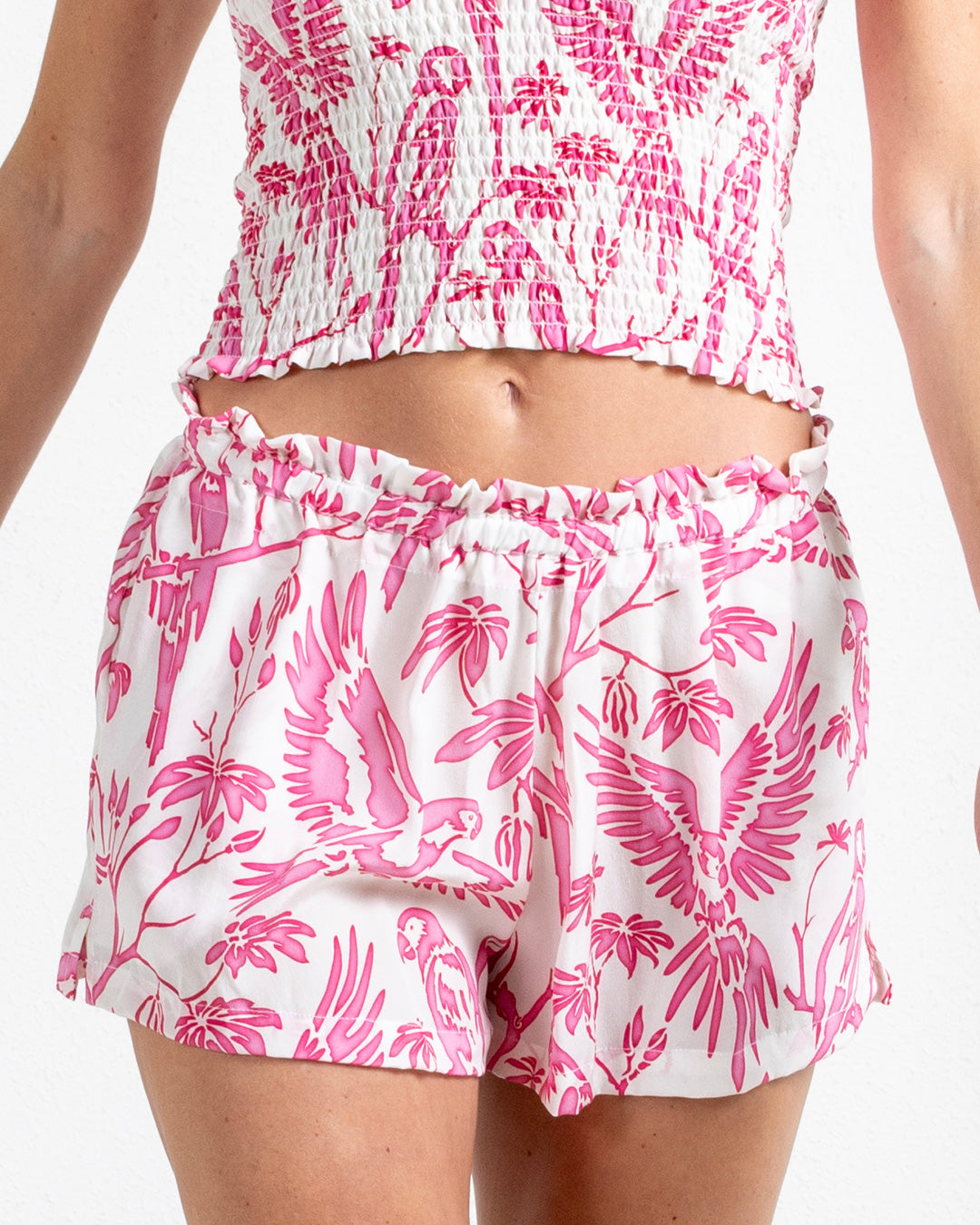 Women's luxury silk crepe shorts in pink Parrot print – tropical designer loungewear or sleepwear by Lotty B Mustique