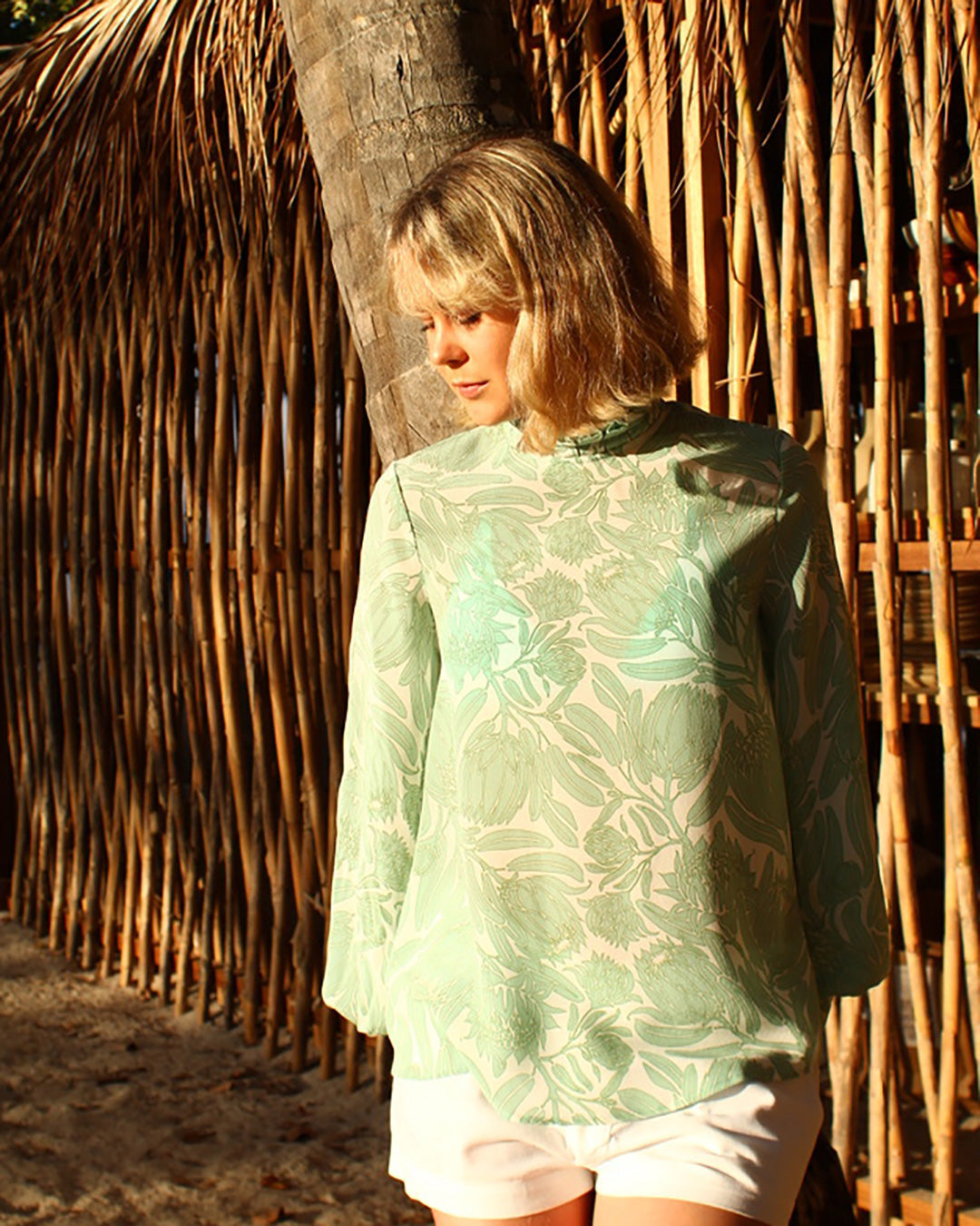Elegant summer party style pure silk Kelly blouse in Protea sage green and white by designer Lotty B for Pink House