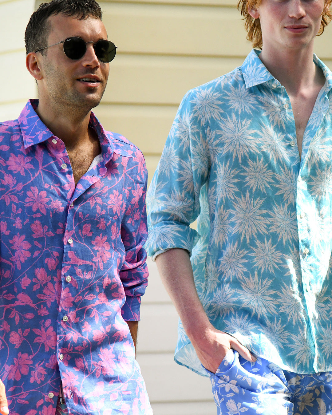 Men wearing Iguana Blue & Pink linen shirt and Agave Turquoise linen shirt, relaxed island resort style on Mustique.