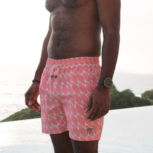 Men's island holiday swim shorts in coral pink Striped Shell print by designer Lotty B