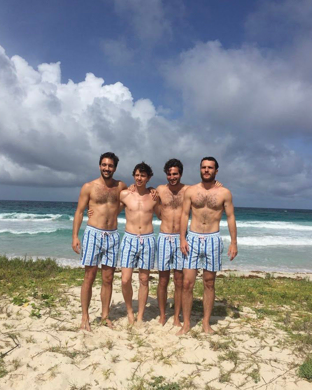 Mens palm stripe swim shorts blue group on beach Mustique quick dry summer swimwear