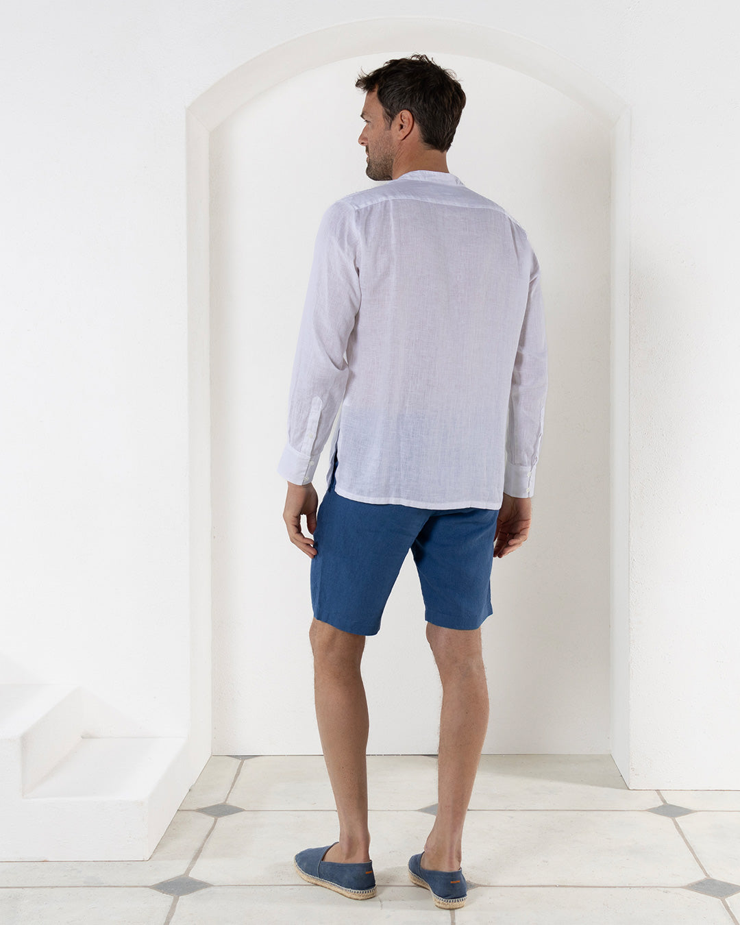 Mens white linen collarless shirt back view with grandad Nehru collar, lightweight breathable summer style