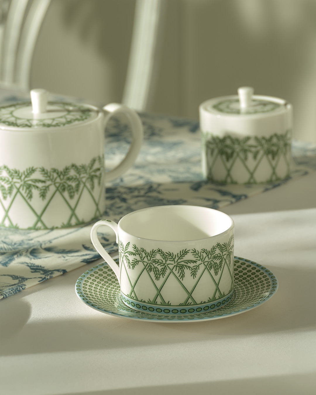 Elegant fine bone china cup and saucer in Palms Sage Green, luxury tea or coffee set by Pink House Mustique.