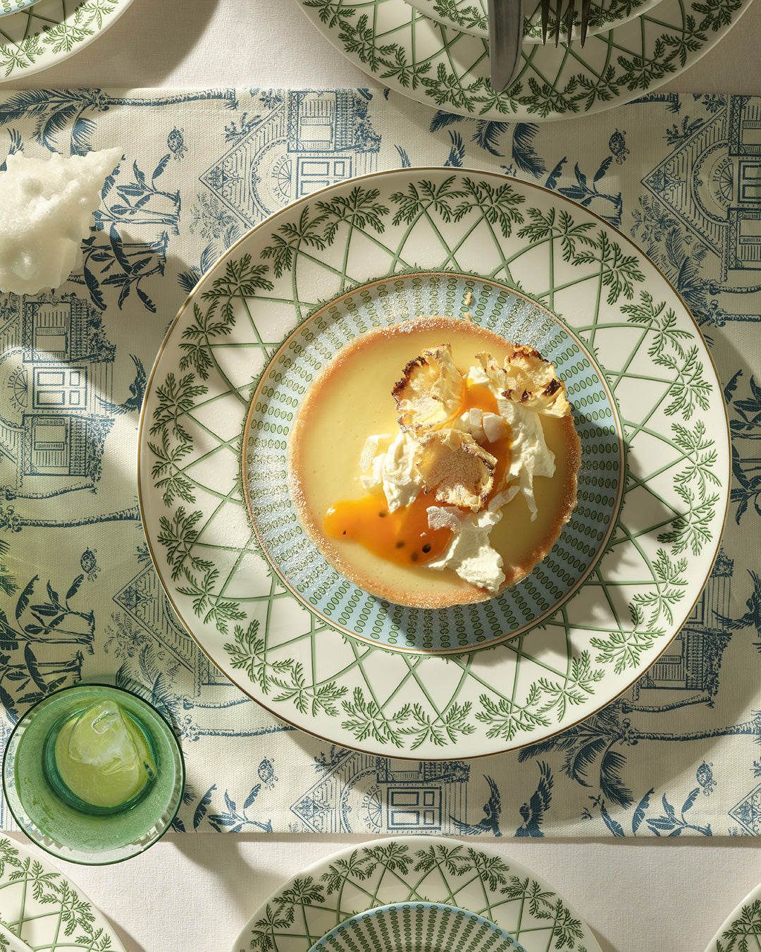 Luxury fine bone china charger plate in Palms Sage Green design, elegant decorative tableware inspired by Mustique living.