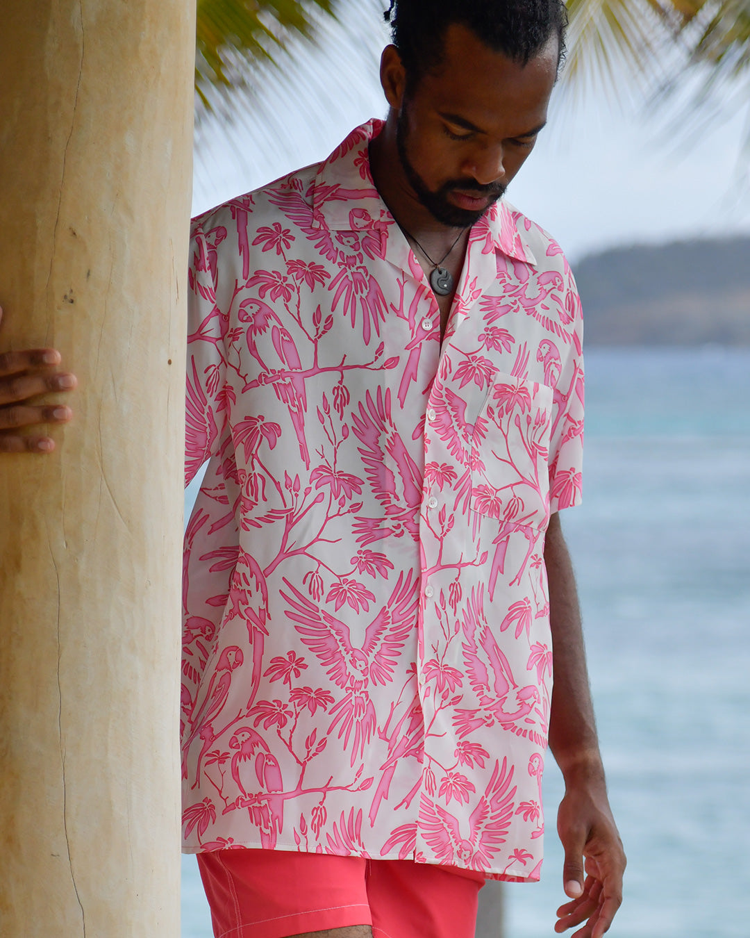 Men's Parrot Pink silk Festival Shirt featuring hand-drawn parrot print at Frenchman's Field Villa