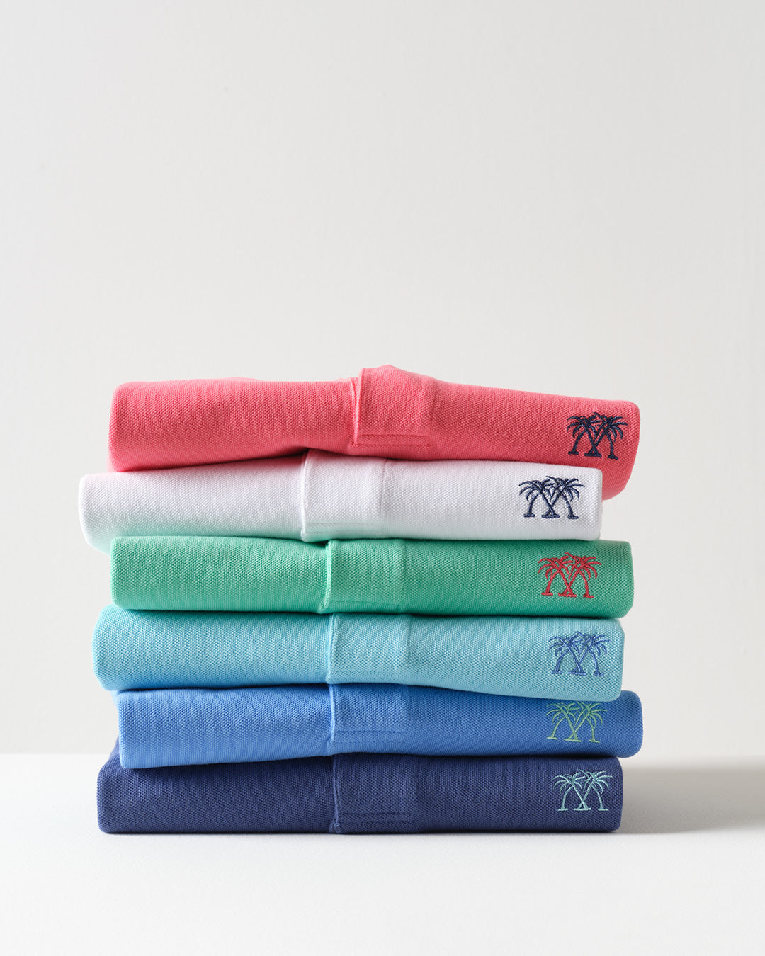 Luxury men's cotton polo shirts by Pink House Mustique in a range of classic summer colours
