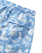 Back pocket detail of Magnolia print swim shorts in blue | Eco-friendly Iguana design | Pink House Mustique