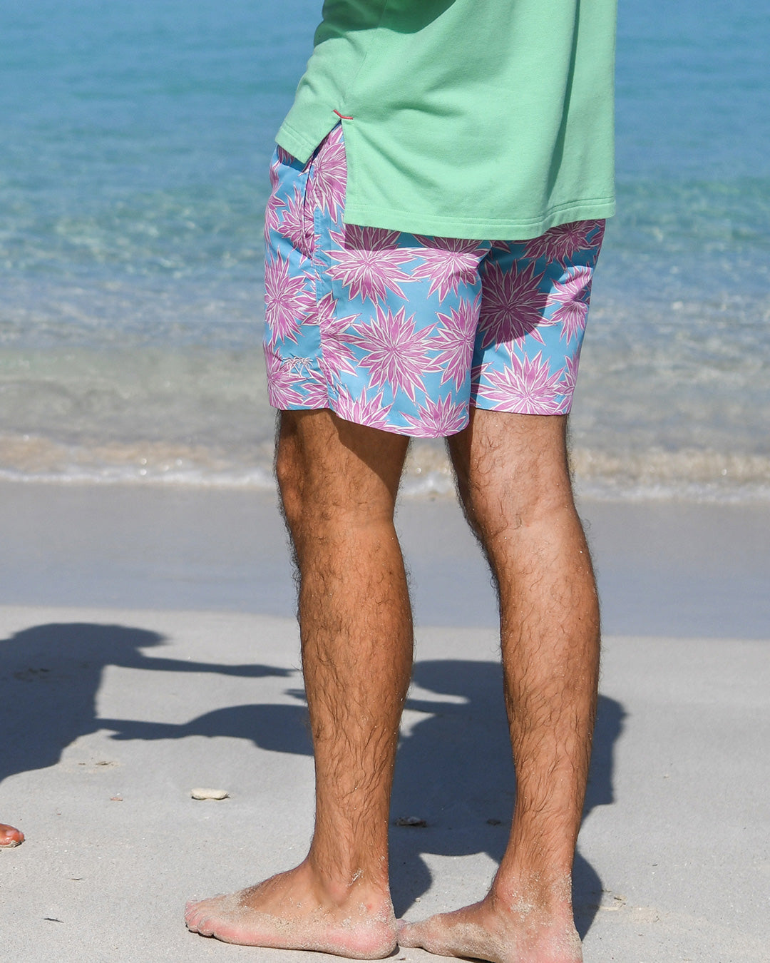 Back view Agave turquoise and pink men’s recycled swim shorts, Pink House Mustique sustainable resortwear.