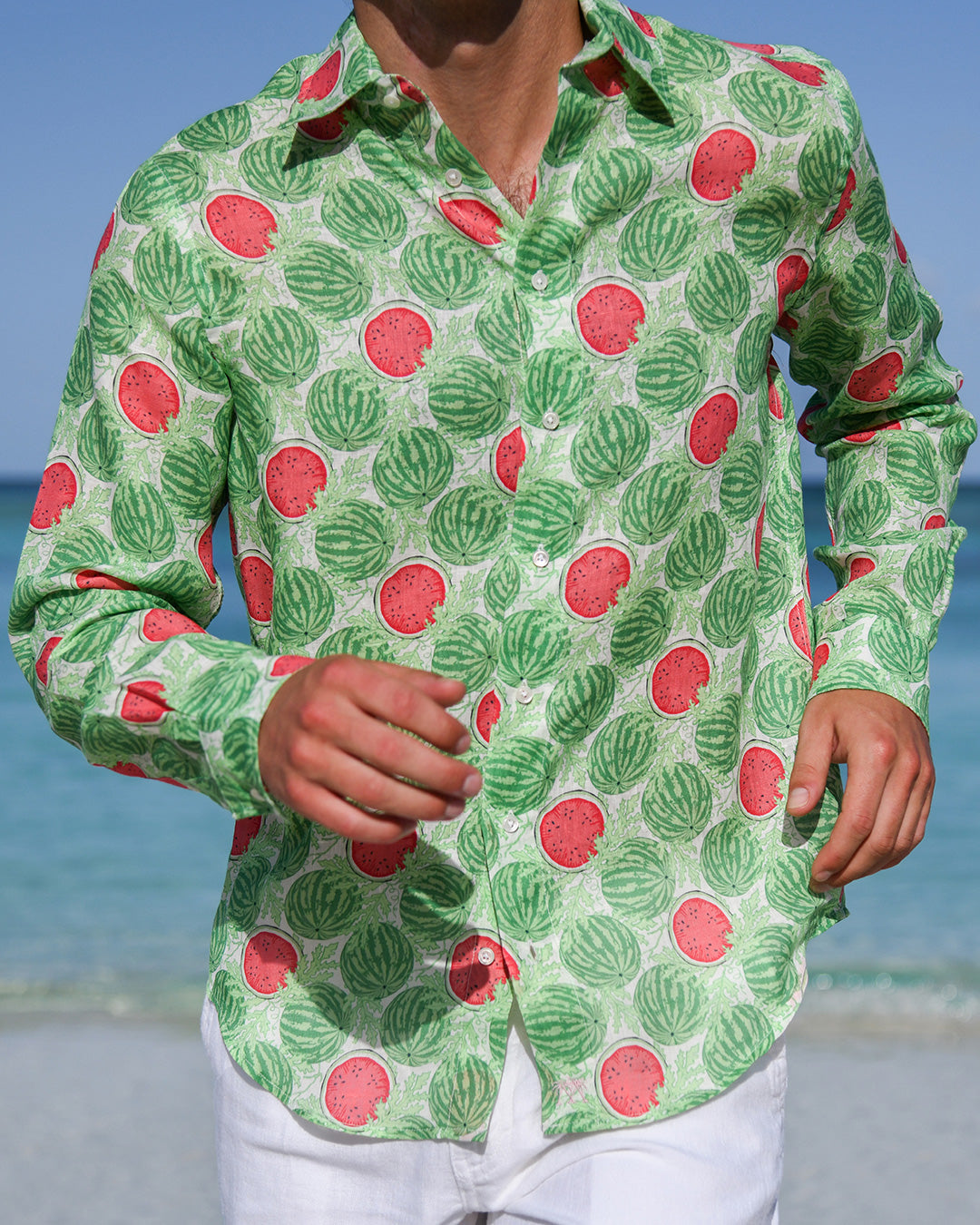 Close-up of men’s Watermelon Green linen shirt showing collar, buttons, curved hem and watermelon print