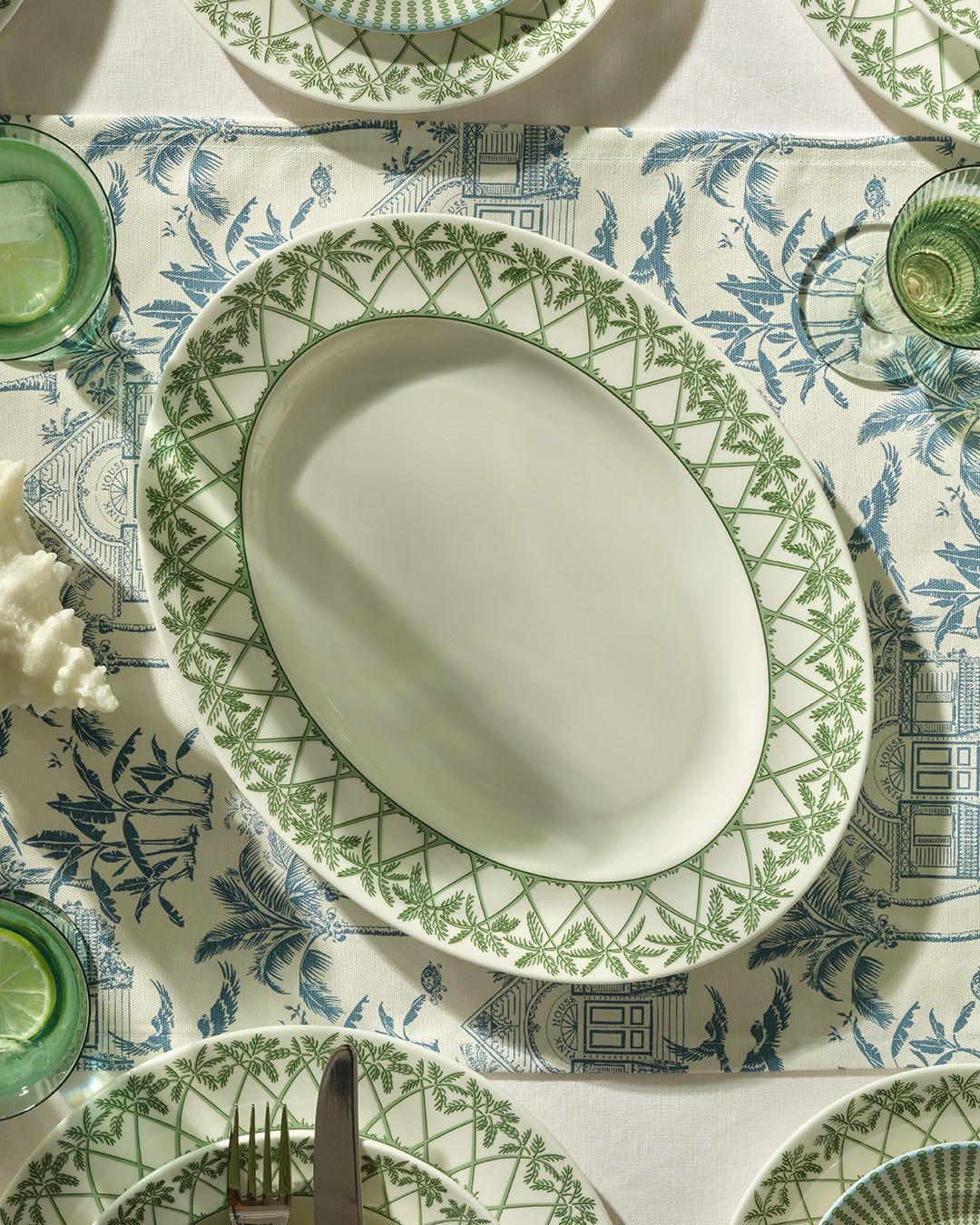 Fine bone china oval serving platter in Palms Sage Green, perfect for elegant dining and island-inspired entertaining.