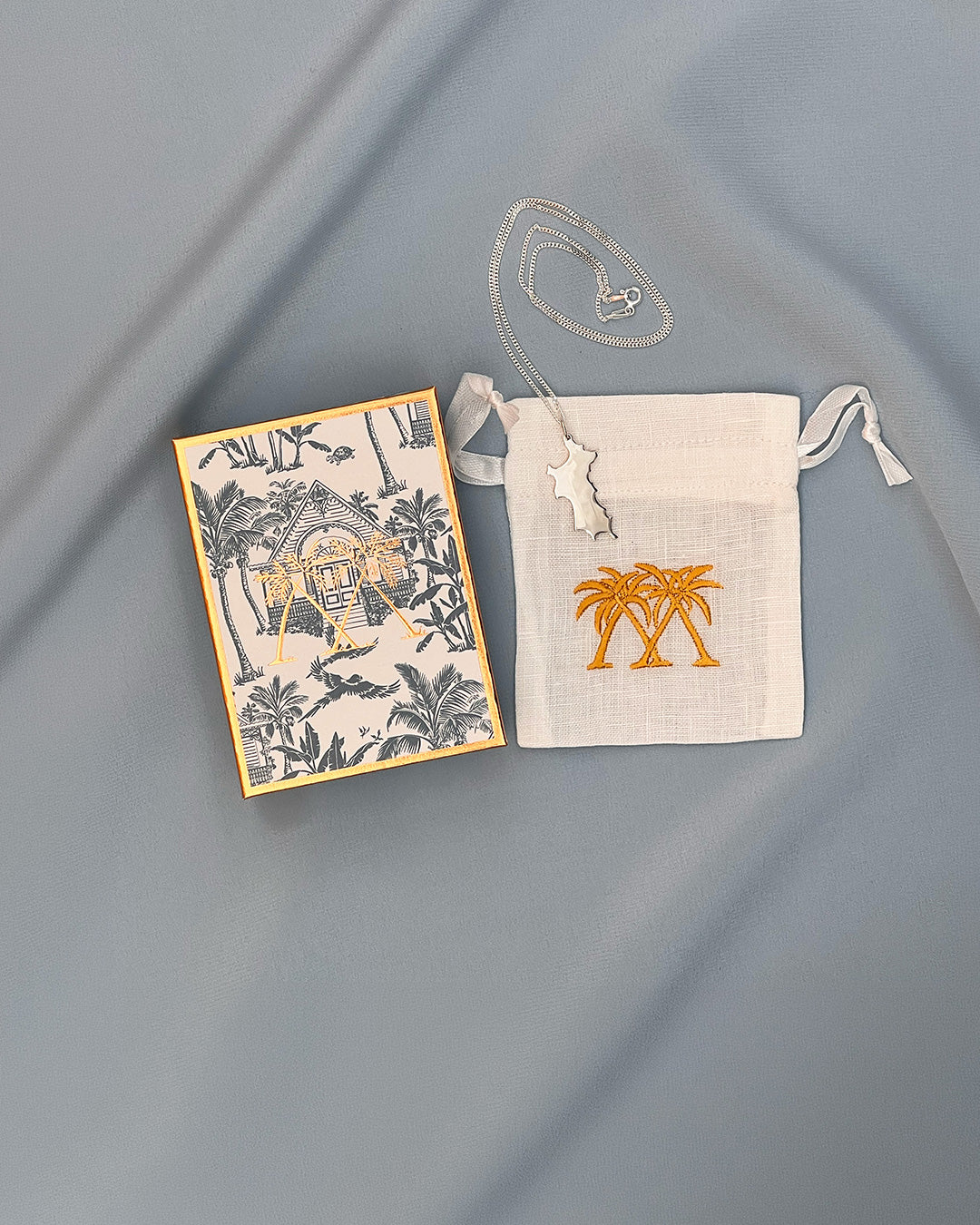 Hallmarked sterling silver Mustique island pendant necklace with gift box and pouch luxury jewellery Made in England