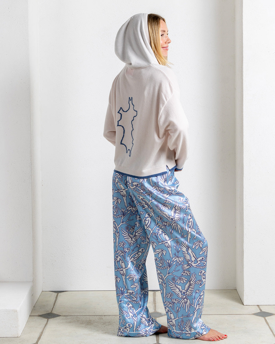 Luxury navy cashmere hoodie collab Pink House Mustique and Malin Darlin beige with navy blue trim