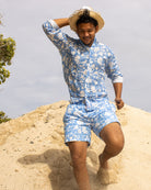 Vacation-ready Iguana Blue linen shirt and swim shorts set — breathable, fast-drying and perfect for island life.