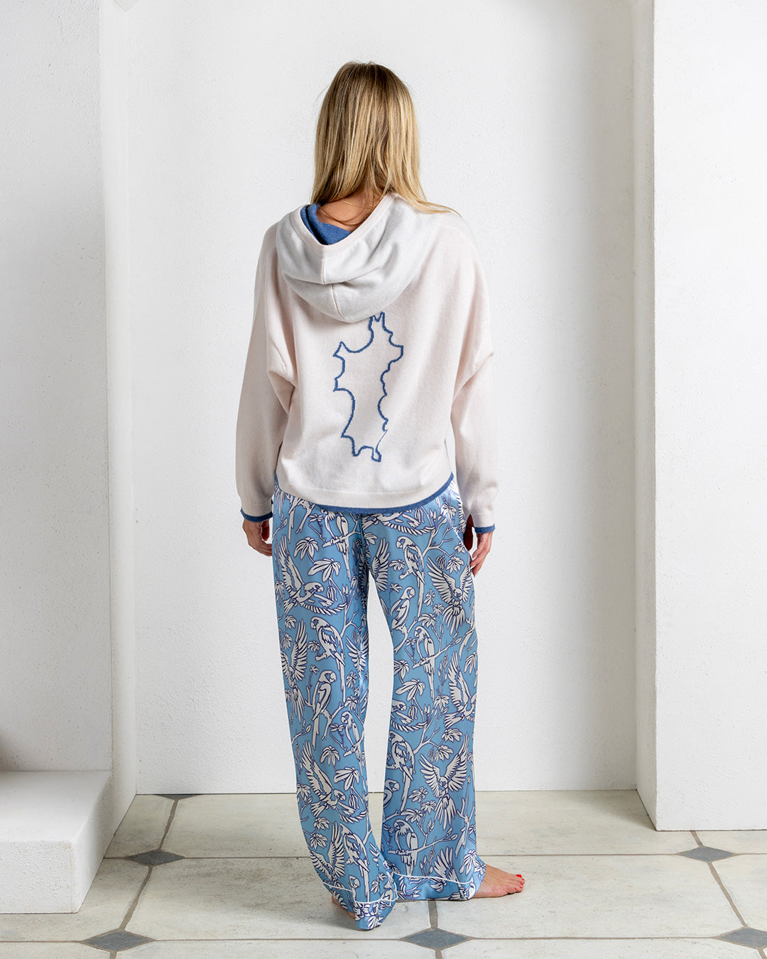 Darlin London x Pink House Mustique cashmere hoodie beige with navy blue trim Mustique Island back design