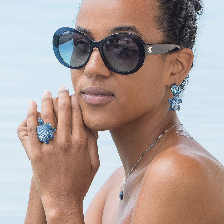 Drop Earrings : MUSTIQUE SEA LIFE TURTLE - BLUE designed by Catherine Prevost in collaboration with Atelier Swarovski is in aid of the St. Vincent & the Grenadines Environment Fund.