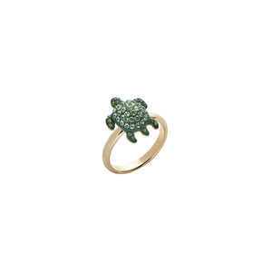 Celebrate the beauty and wonder of endangered or at risk species in the Caribbean: the Hawksbill Turtle Cocktail ring - Swarovski Crystal in Shining Green; pale gold plating; brass; designed by Catherine Prevost for Atelier Swarovski