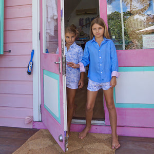 Childrens Linen Shirt: FRENCH BLUE Girls shopping at the Pink House boutique on Mustique