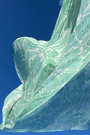 Floaty silk chiffon scarf in green & white Protea print by designer Lotty B Mustique